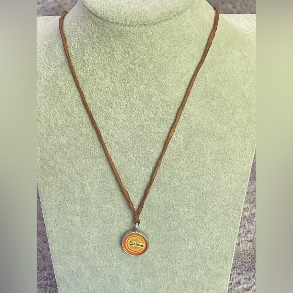 “Believe” Pendant Necklace on Brown Cord